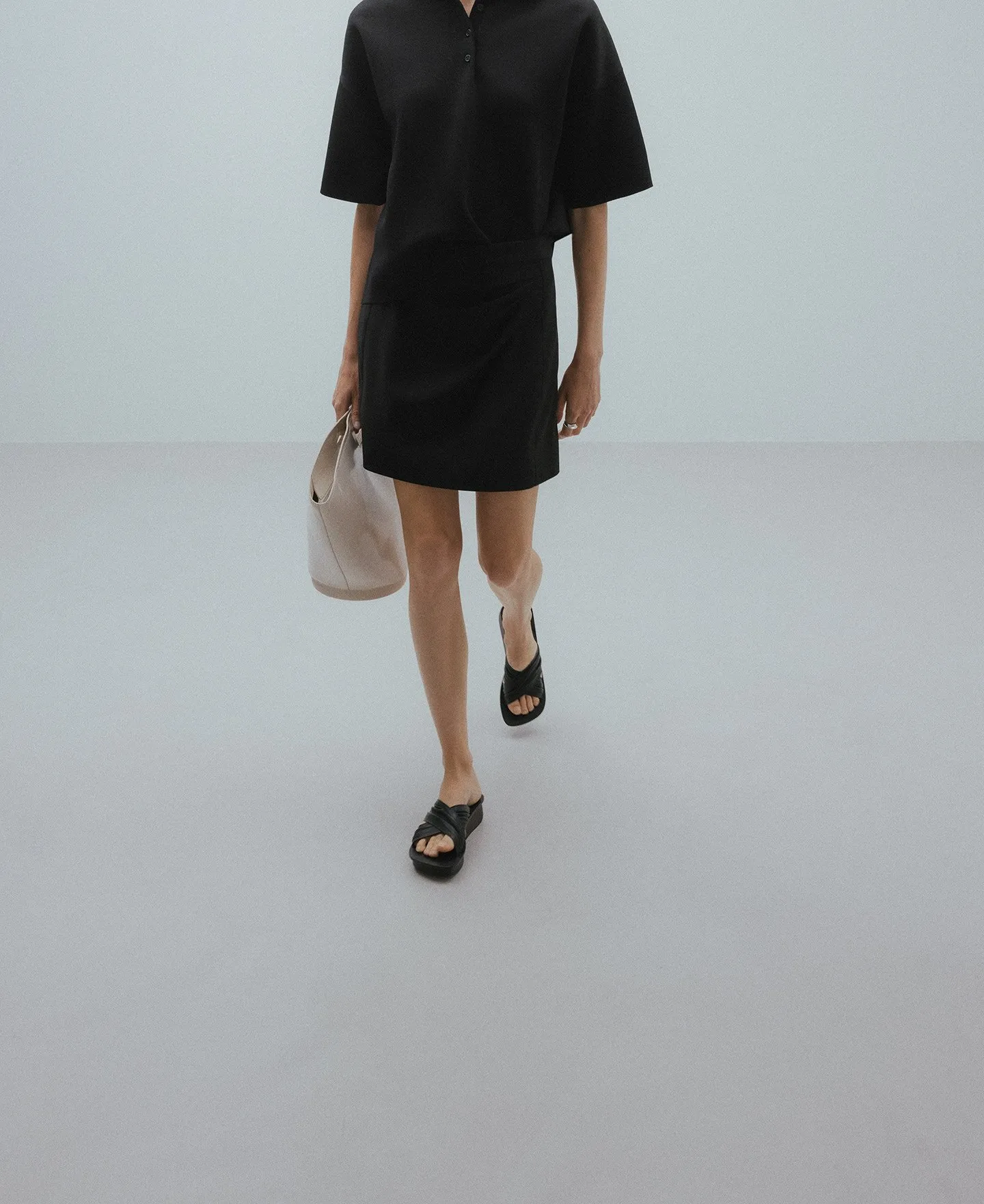 Black ruched miniskirt woman