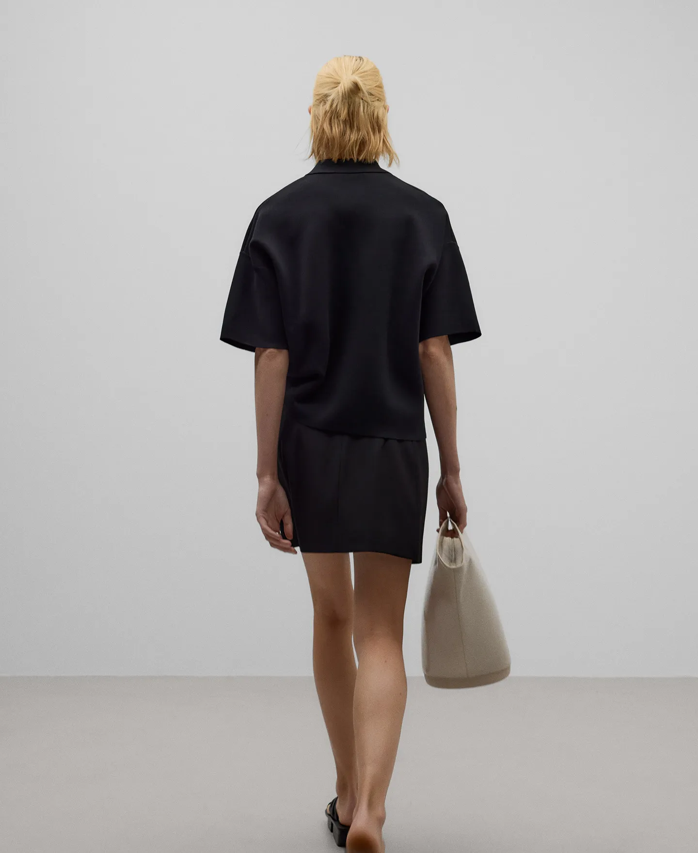 Black ruched miniskirt woman
