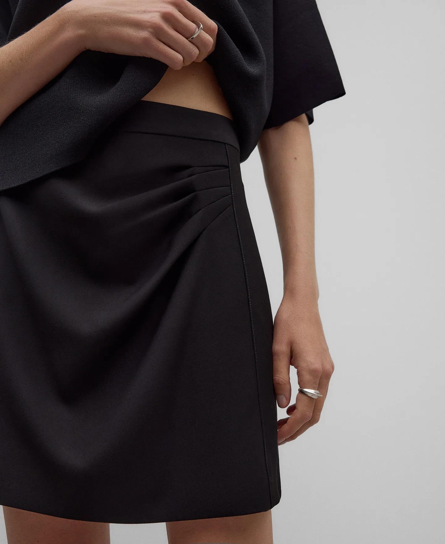 Black ruched miniskirt woman