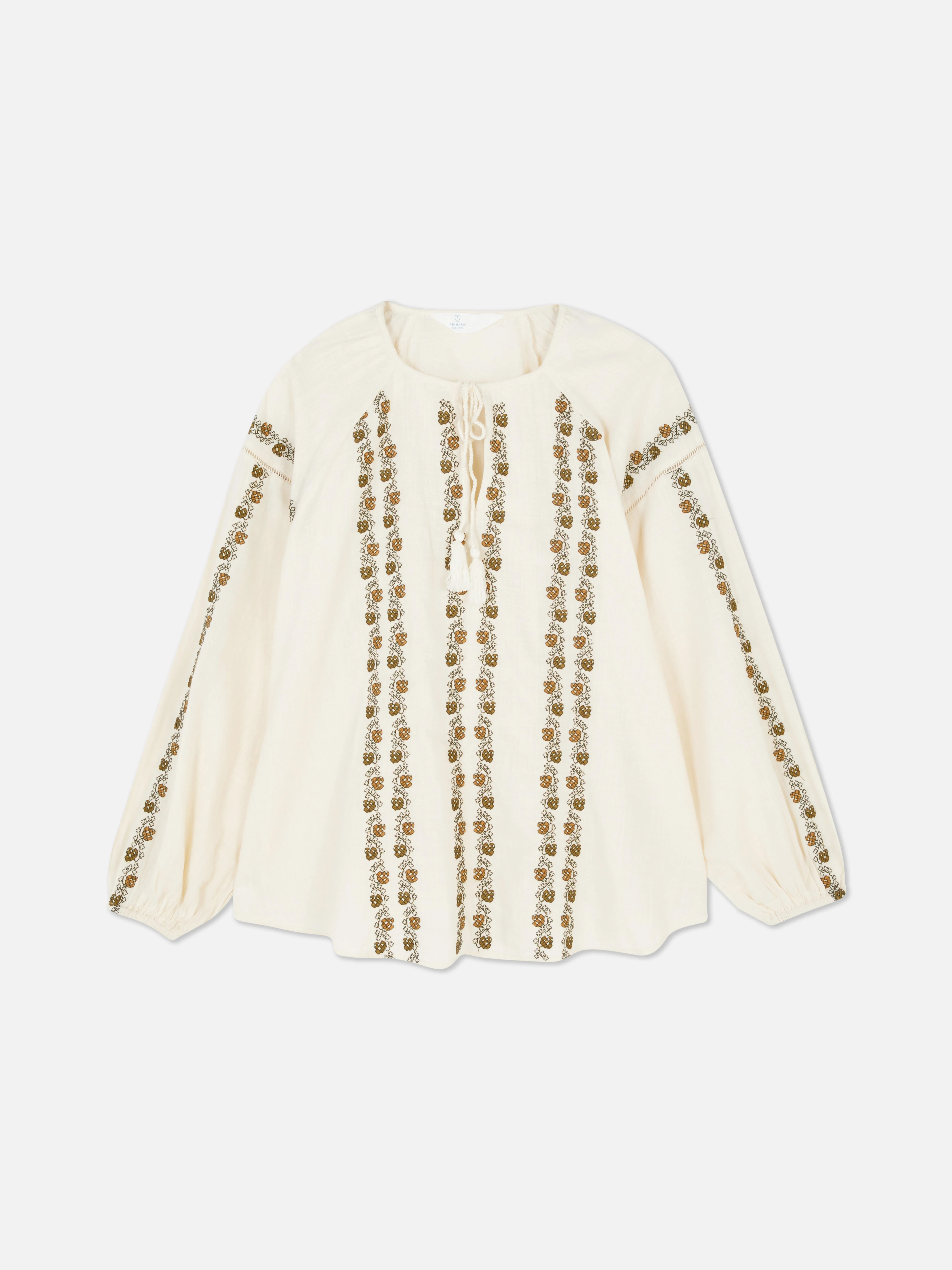Blusa bordada con vuelo