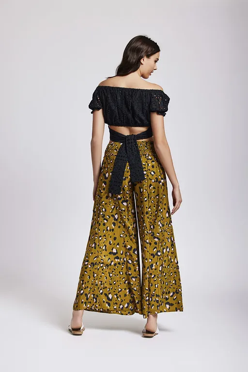 Pantalon palazzo animal print verde