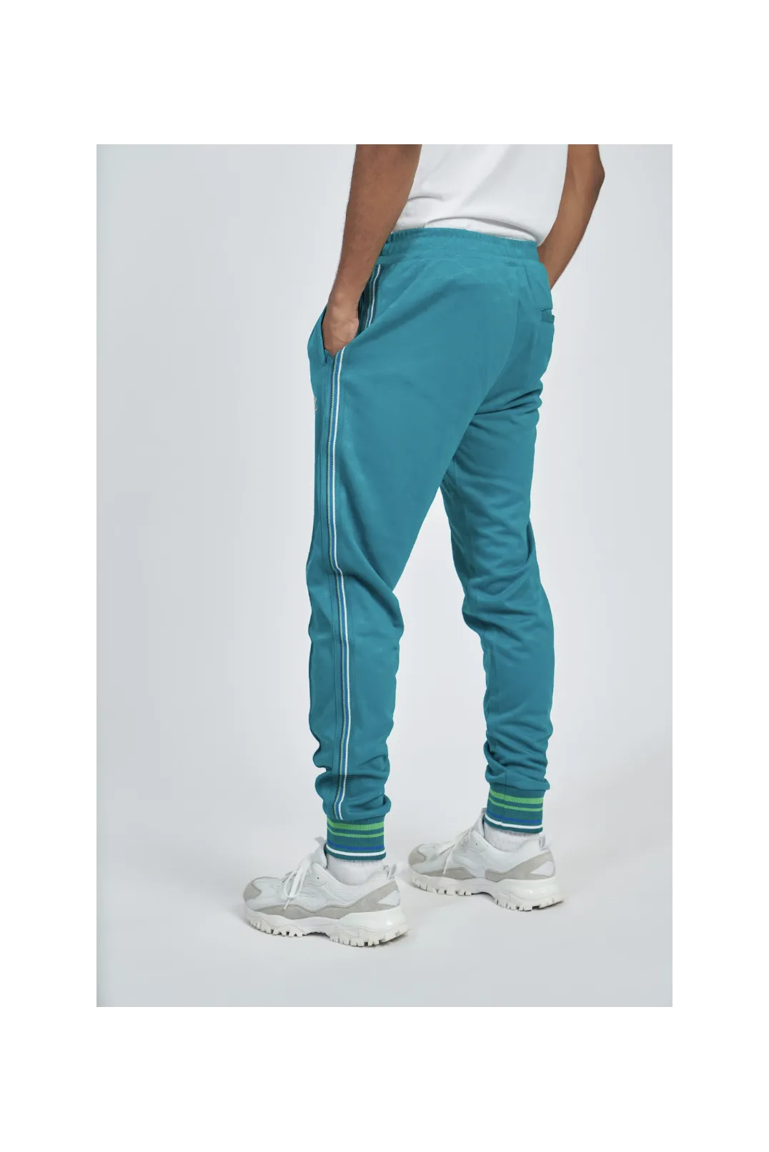 Pantalón Umbro Monogram Track Quetzal Green