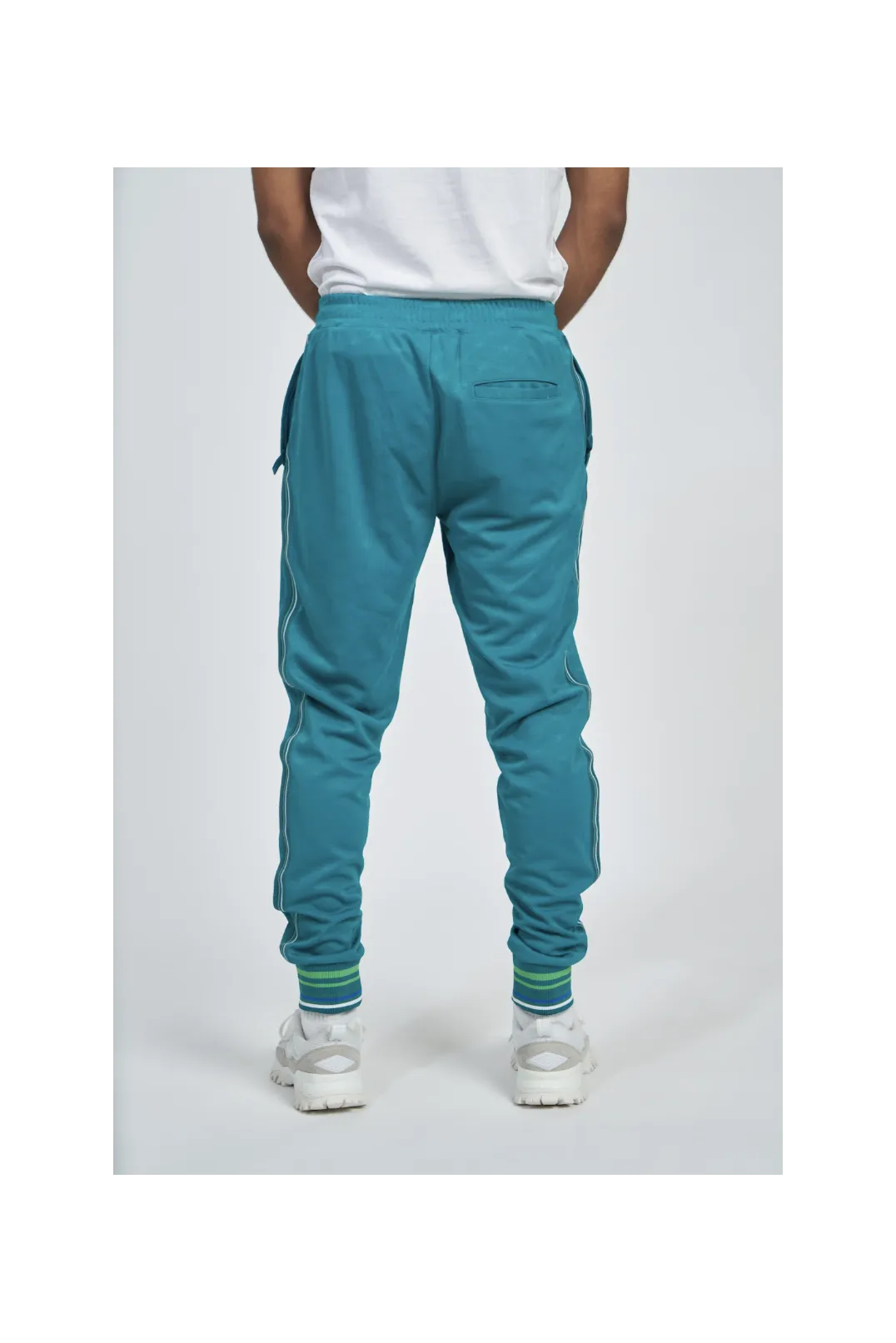 Pantalón Umbro Monogram Track Quetzal Green