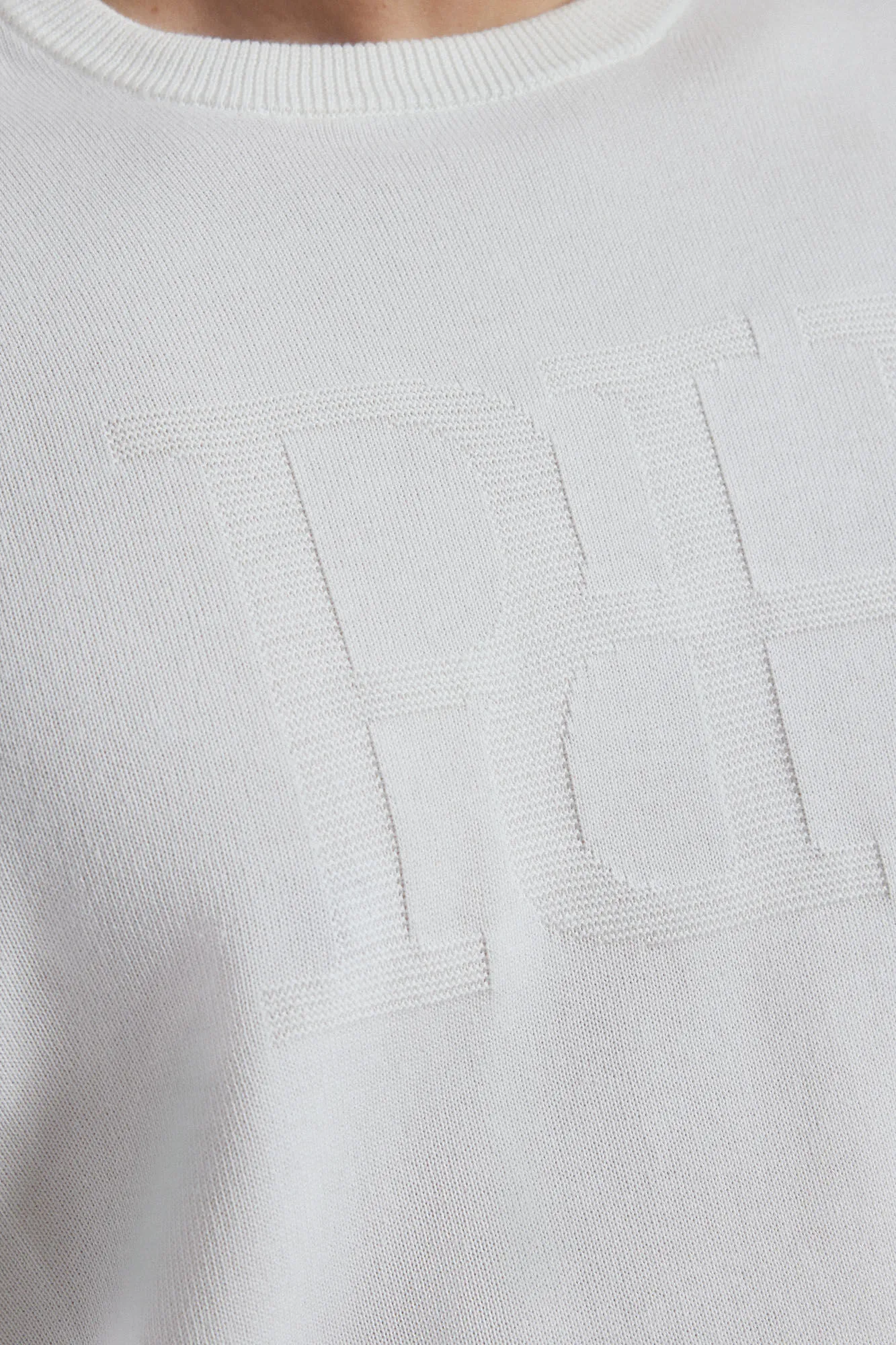Round neck jumper with chest logo